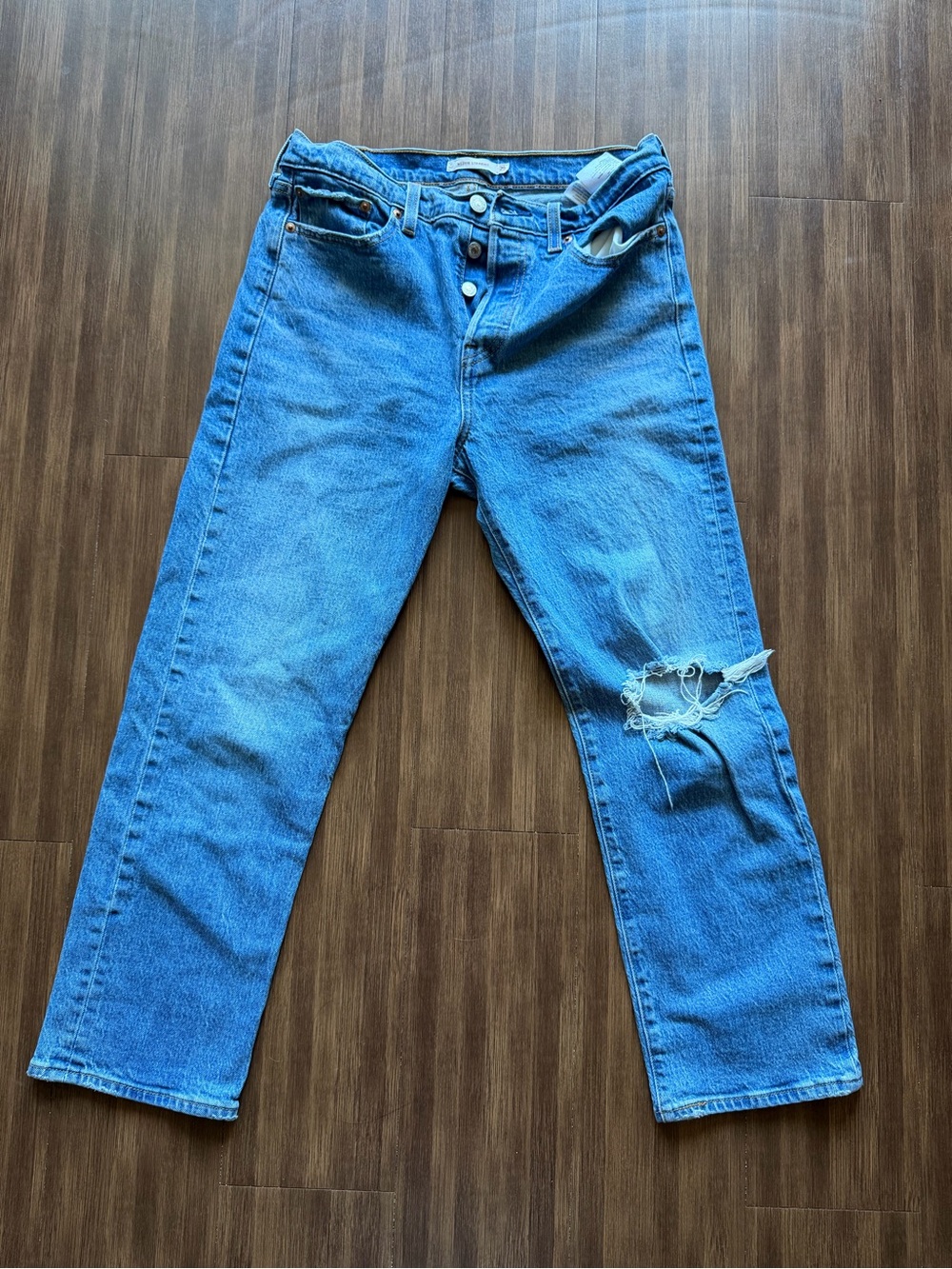 Classic Blue Denim Jeans with Distressed Knee